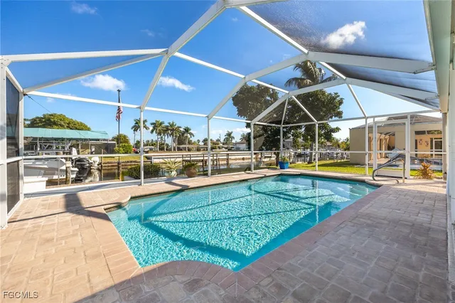 wooden view of a swimming pool and outdoor space