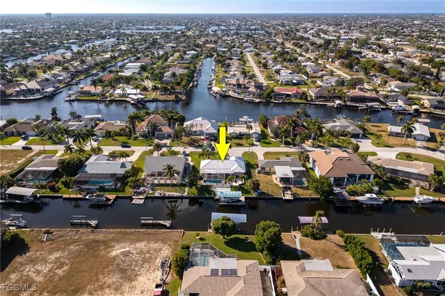 an aerial view of a houses with outdoor space