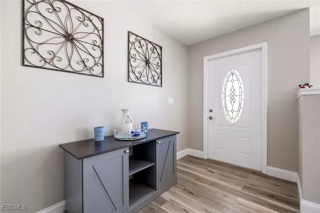 a view of bathroom with furniture and wooden floor