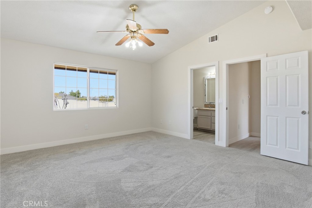 17964 Hackberry Street Hesperia, CA 92345 - Photo 21 of 32 a view of an empty room with a window