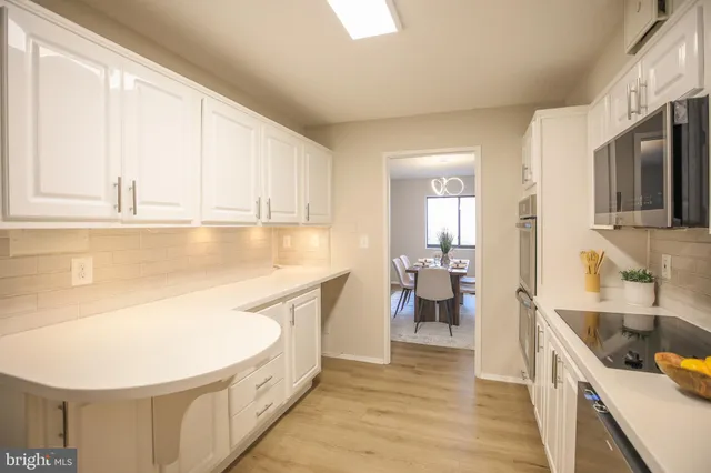 a bathroom with a sink a mirror and a bathtub