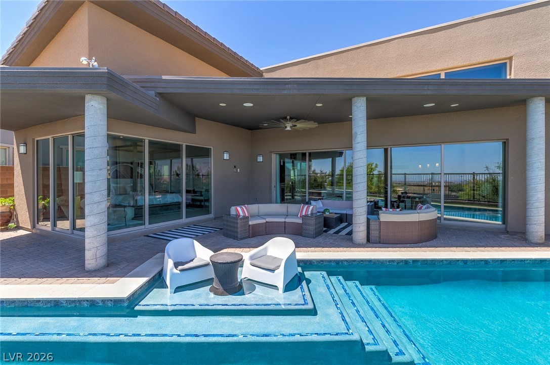 6014 Willow Ridge Court Las Vegas, NV 89135 - Photo 71 of 99 This outdoor oasis features a refreshing pool, covered patio, and serene views for ultimate relaxation.