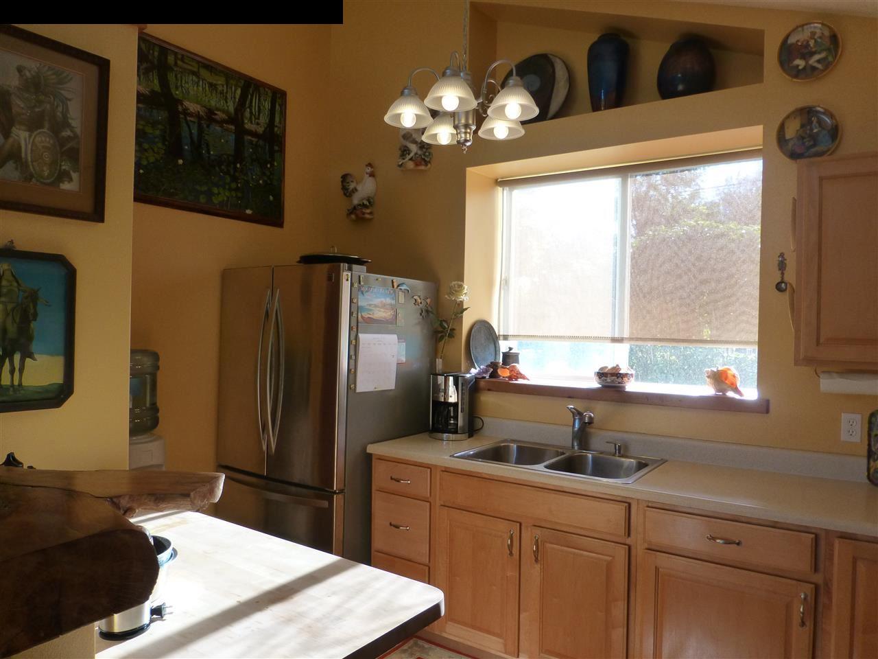 1333 Haiku Road Haiku, HI 96708 - Photo 4 of 30 a kitchen with a sink cabinets and window