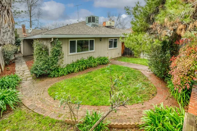 a bedroom with bed and window