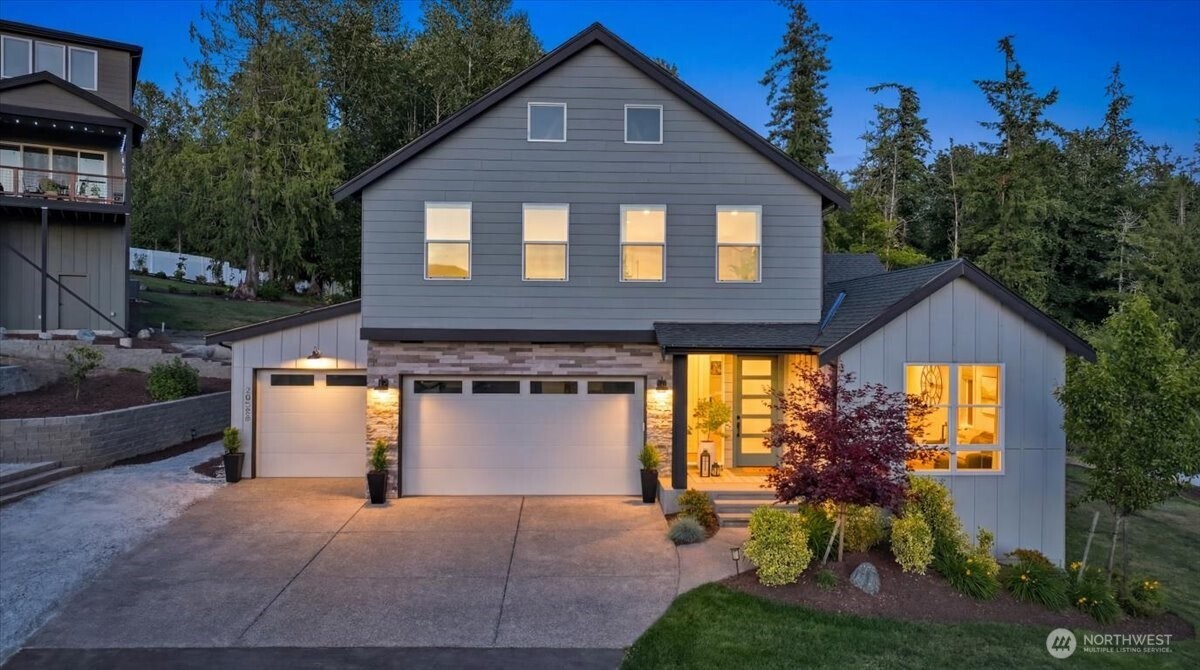 20580 Sinnes Road Mount Vernon, WA 98274 - Photo 3 of 39 a front view of a house with a yard and trees