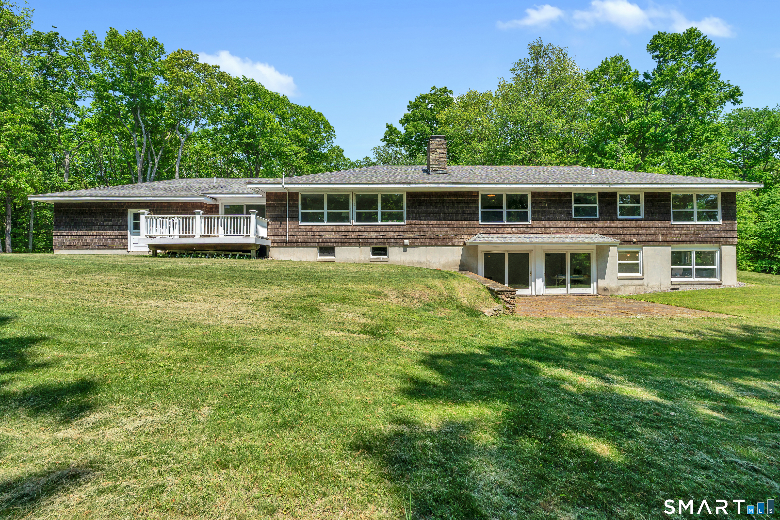 30 Maltbie Road Newtown, CT 06470 - Photo 39 of 40 a house view with a garden space