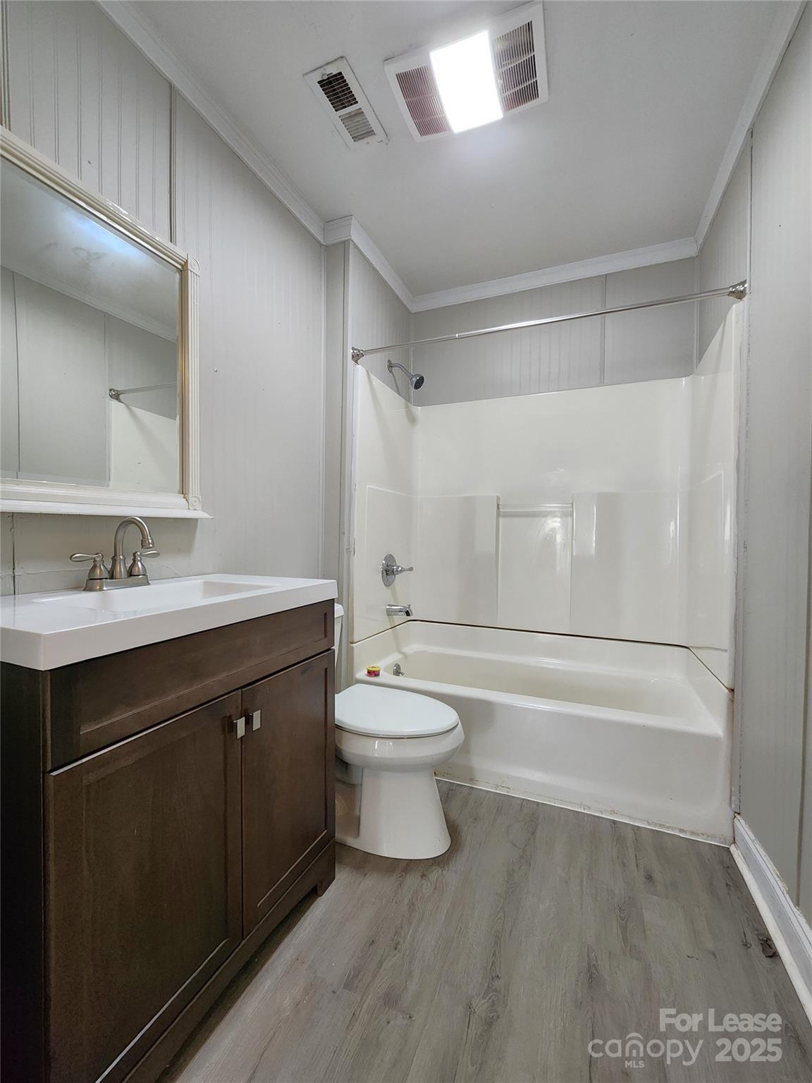 2802 Maryland Avenue Kannapolis, NC 28083 - Photo 10 of 19 a bathroom with a sink a toilet and shower