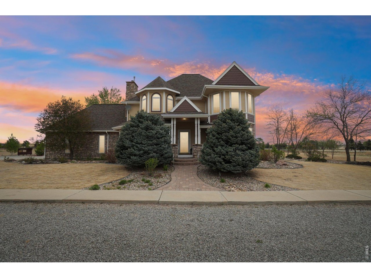 9743 Yellowstone Road Longmont, CO 80504 - Photo 47 of 50 Mature landscaping and timeless design