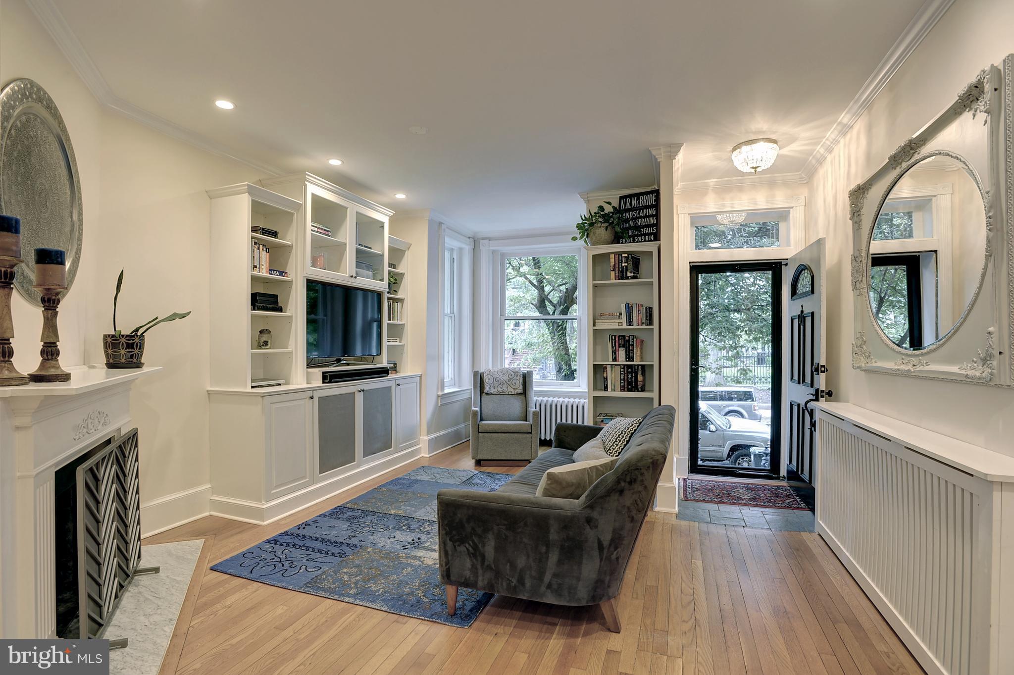 919 E Street Southeast Washington, DC 20003 - Photo 3 of 18 Living Room feat. custom built-ins & fireplace