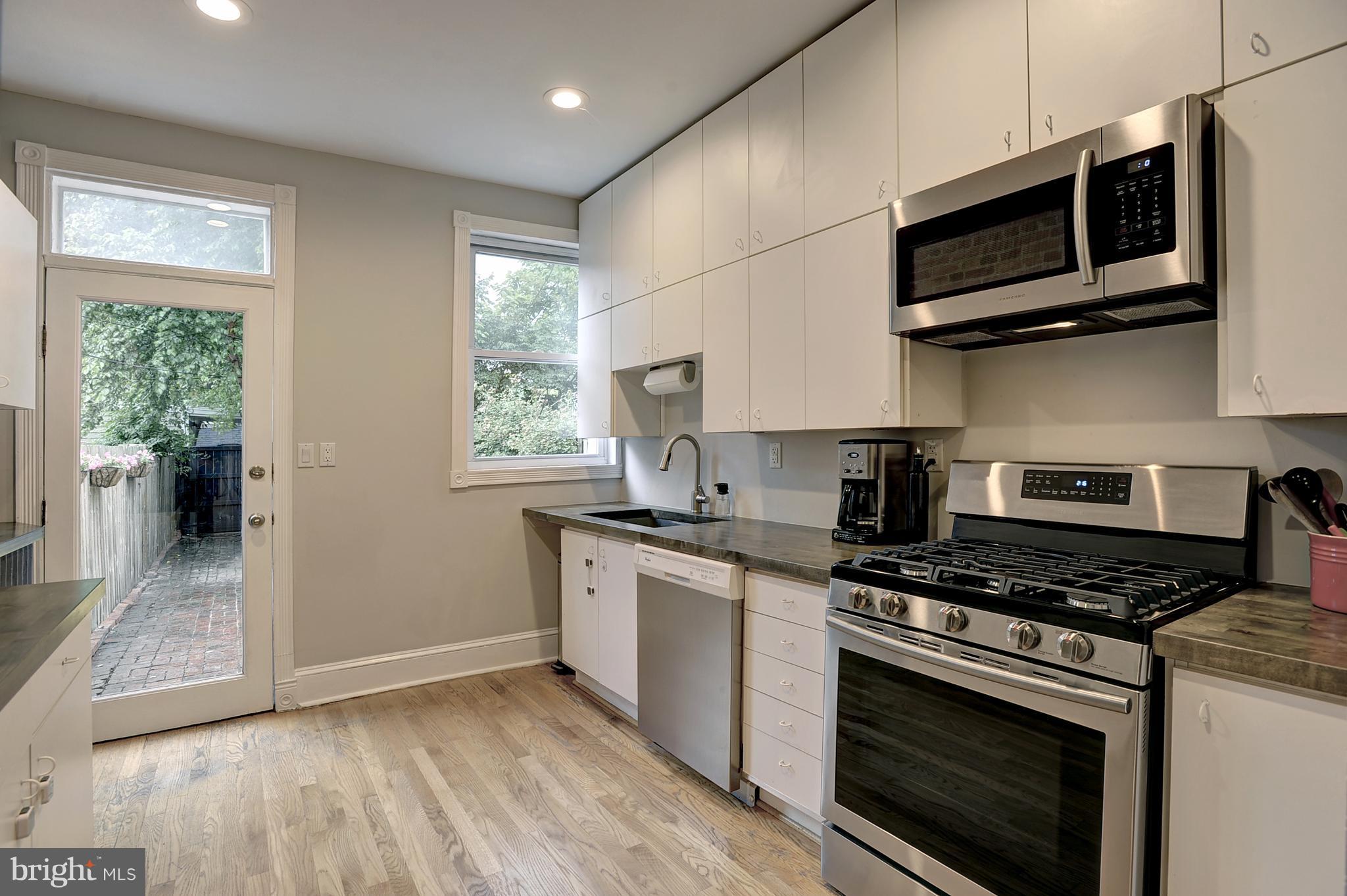919 E Street Southeast Washington, DC 20003 - Photo 5 of 18 Spacious kitchen open to intimate patio