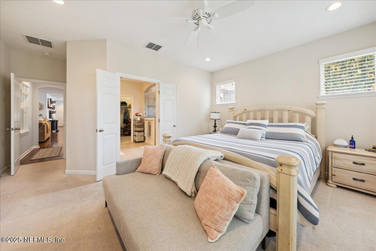 31 Skylar Lane Ponte Vedra, FL 32081 - Photo 13 of 32 a bedroom with double bed and a window