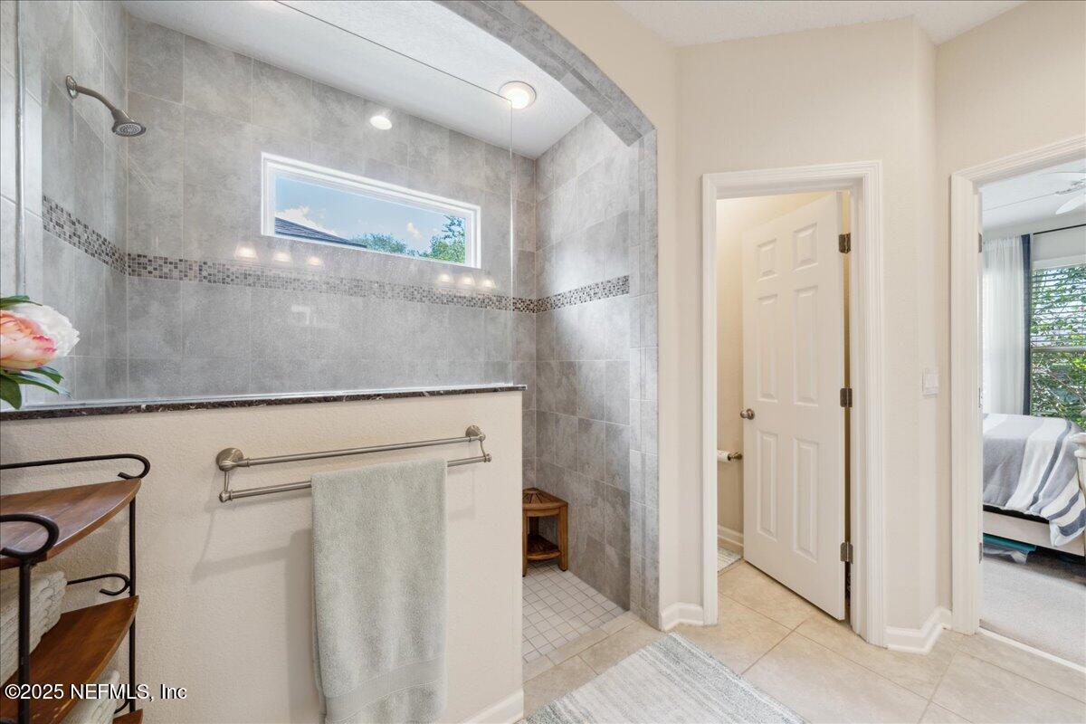 31 Skylar Lane Ponte Vedra, FL 32081 - Photo 16 of 32 a bathroom with a shower and a sink