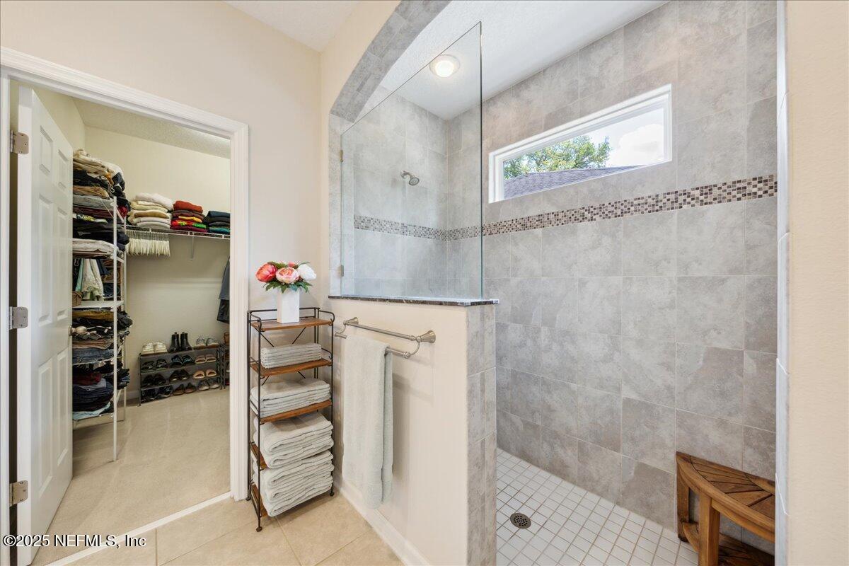 31 Skylar Lane Ponte Vedra, FL 32081 - Photo 17 of 32 a bathroom with a bathtub and a shower