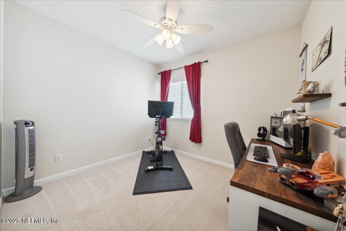 31 Skylar Lane Ponte Vedra, FL 32081 - Photo 22 of 32 a view of a workspace with furniture and a window