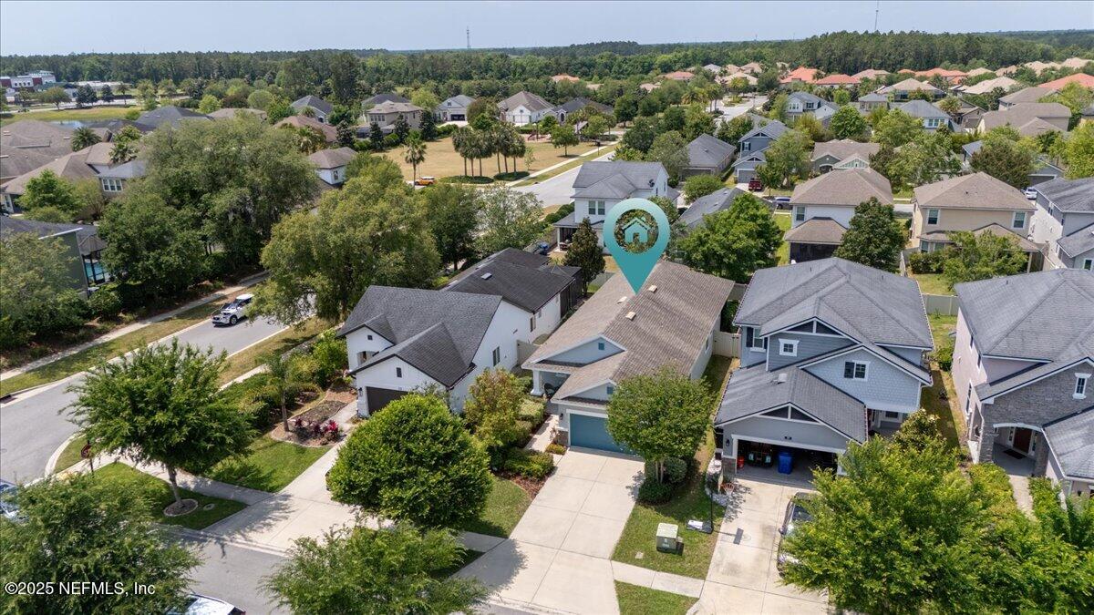 31 Skylar Lane Ponte Vedra, FL 32081 - Photo 26 of 32 an aerial view of multiple houses with yard