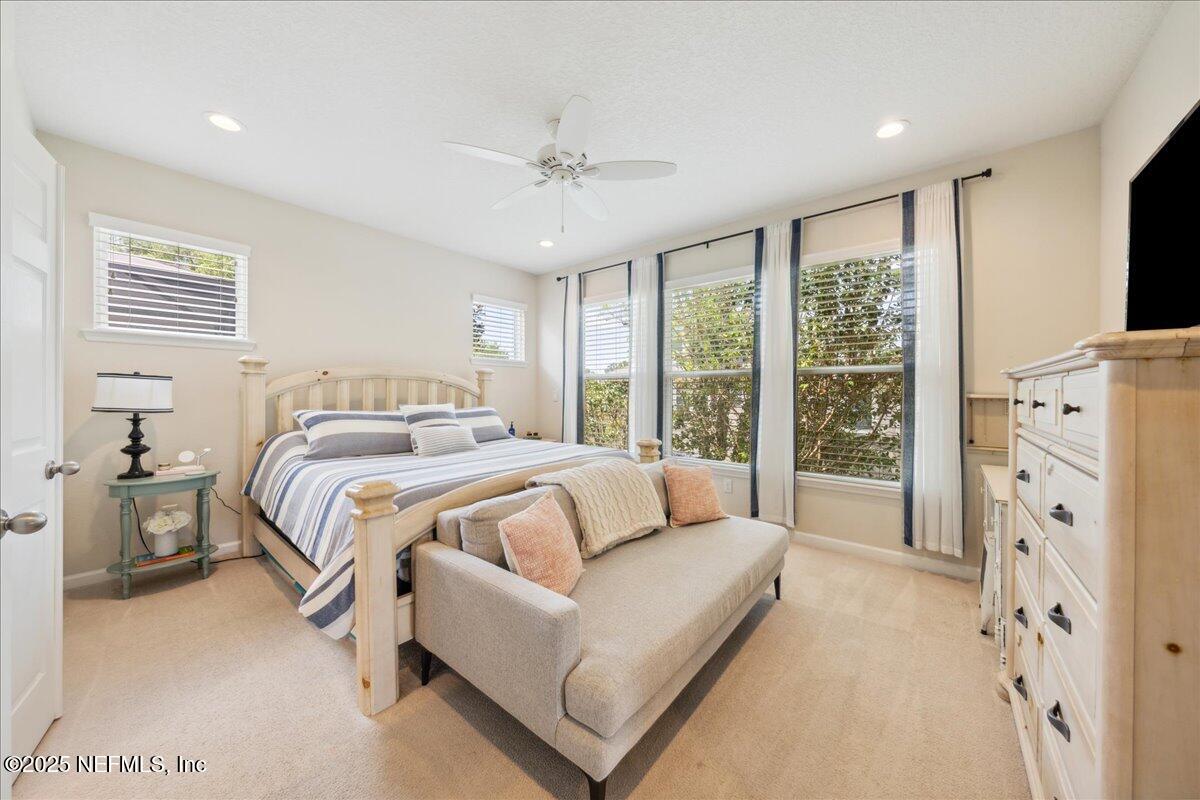 31 Skylar Lane Ponte Vedra, FL 32081 - Photo 5 of 32 a bedroom with bed and flat screen tv