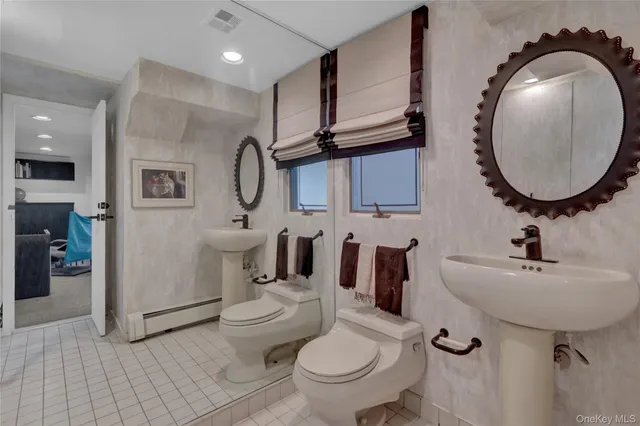 a view of a porch with chairs and backyard