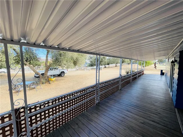 a view of swimming pool with outdoor seating