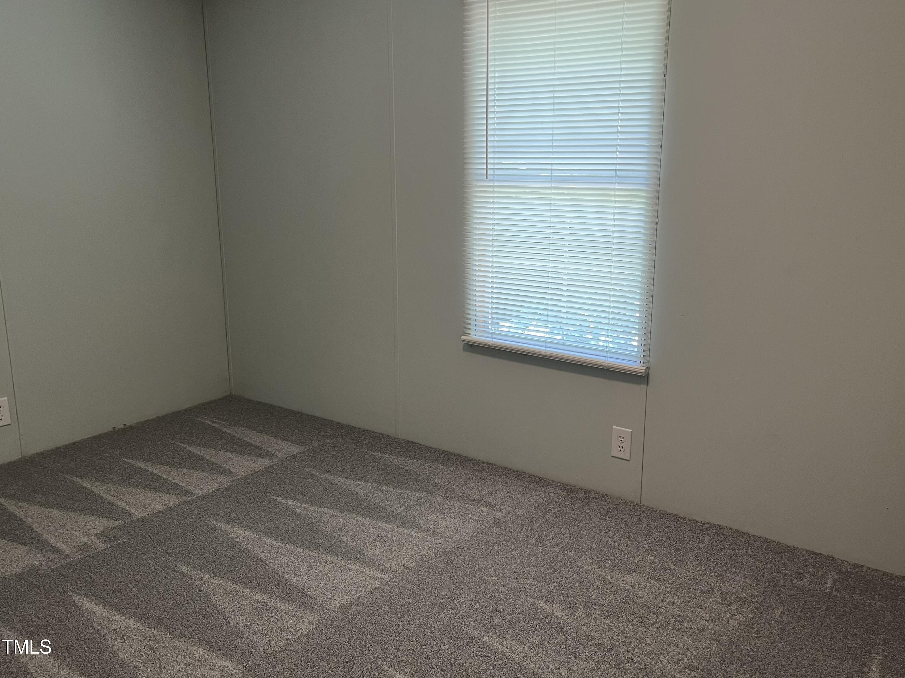 118 Portia Lane Roxboro, NC 27574 - Photo 13 of 16 a view of an empty room with a window