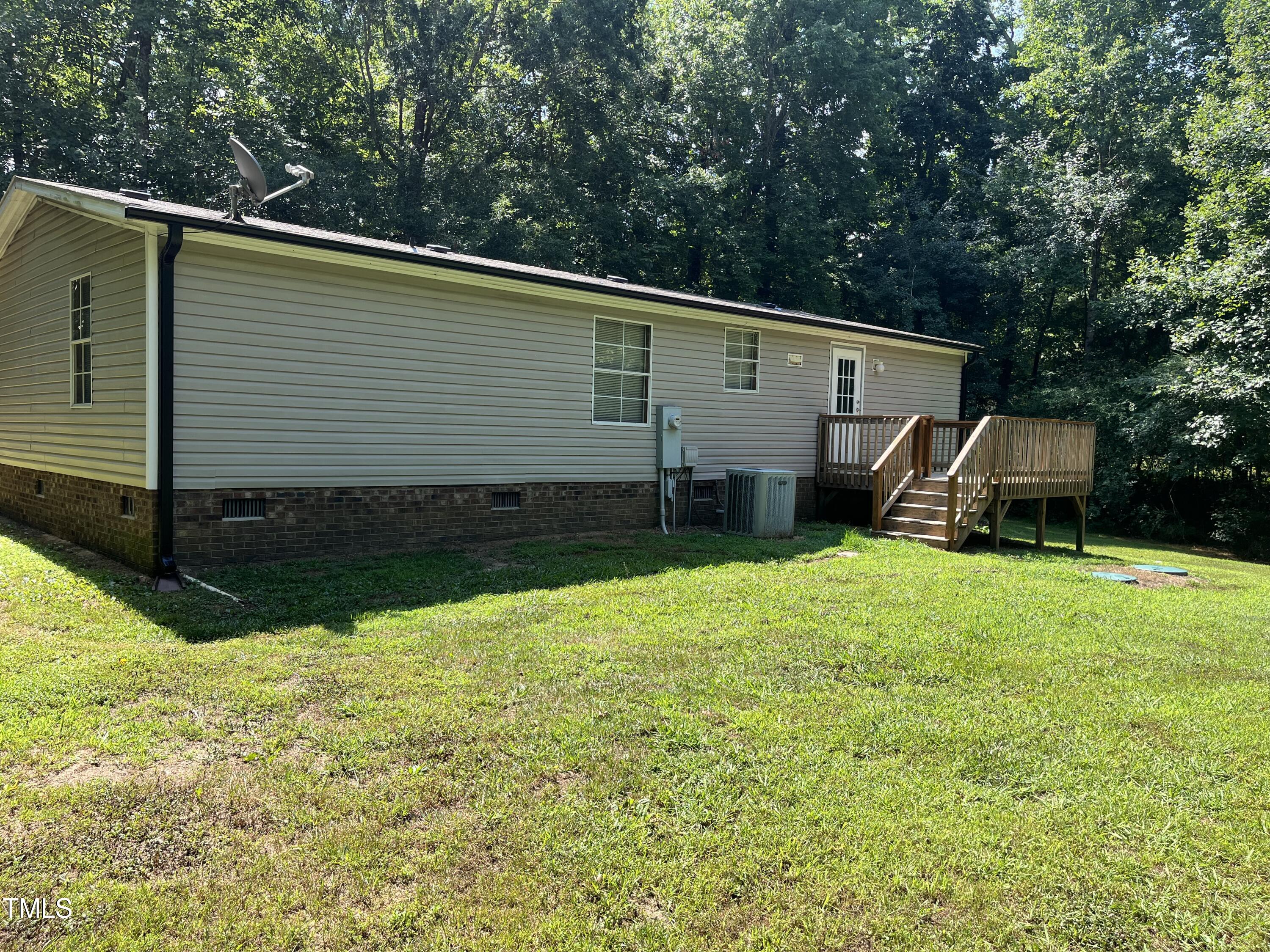118 Portia Lane Roxboro, NC 27574 - Photo 16 of 16 a view of a back yard of the house