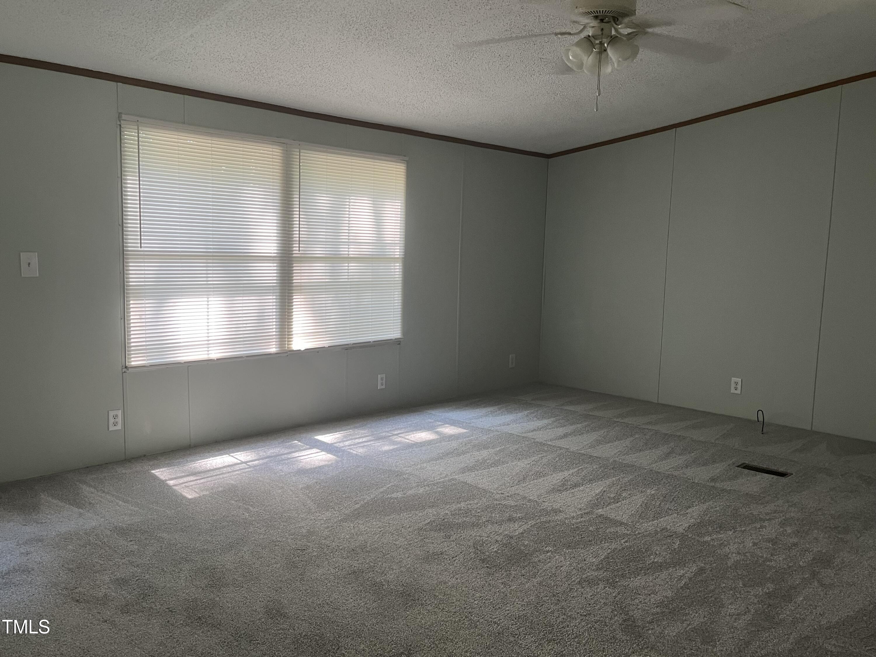118 Portia Lane Roxboro, NC 27574 - Photo 3 of 16 an empty room with a window