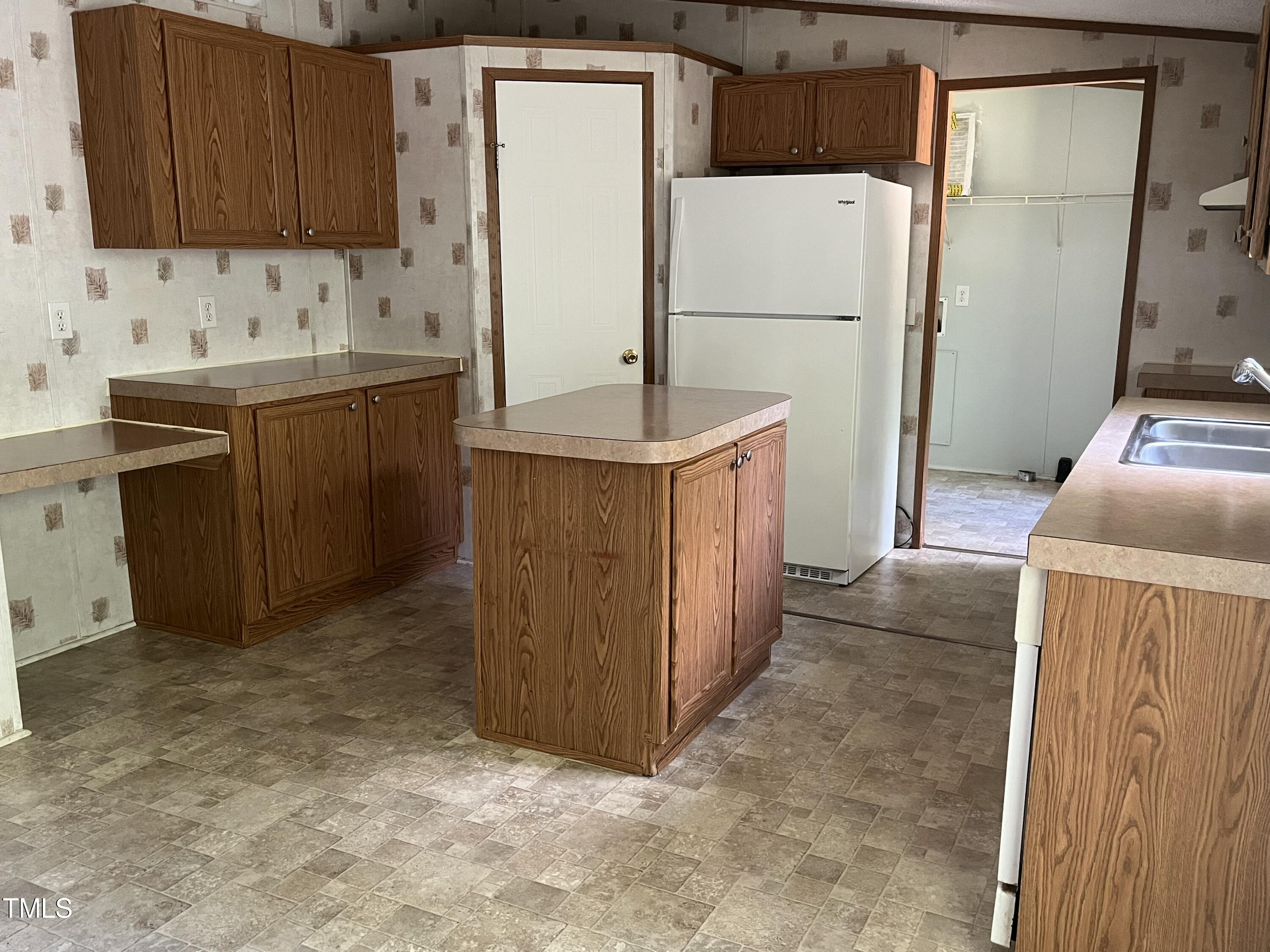 118 Portia Lane Roxboro, NC 27574 - Photo 4 of 16 a room with storage and utility
