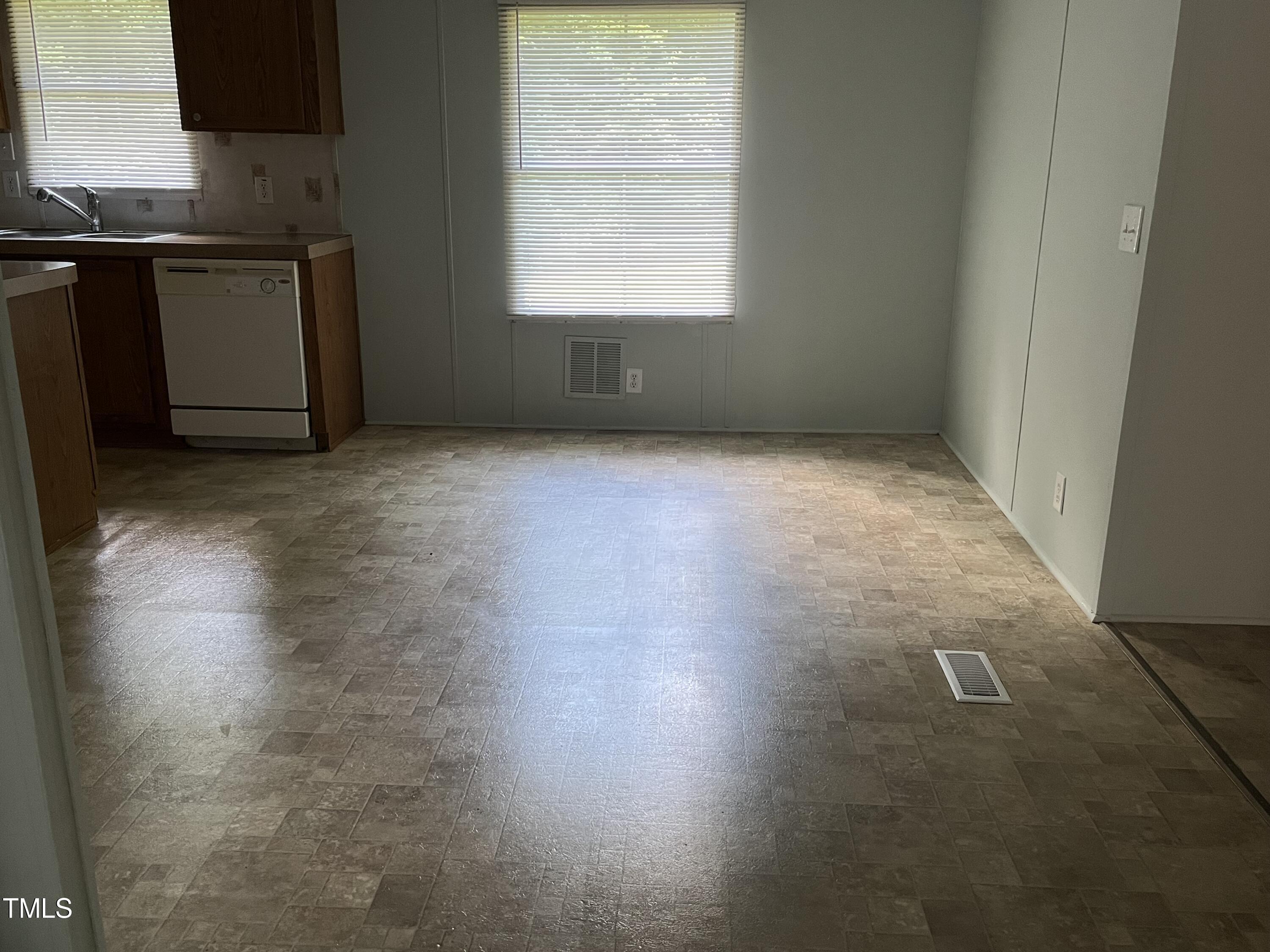 118 Portia Lane Roxboro, NC 27574 - Photo 5 of 16 an empty room with windows