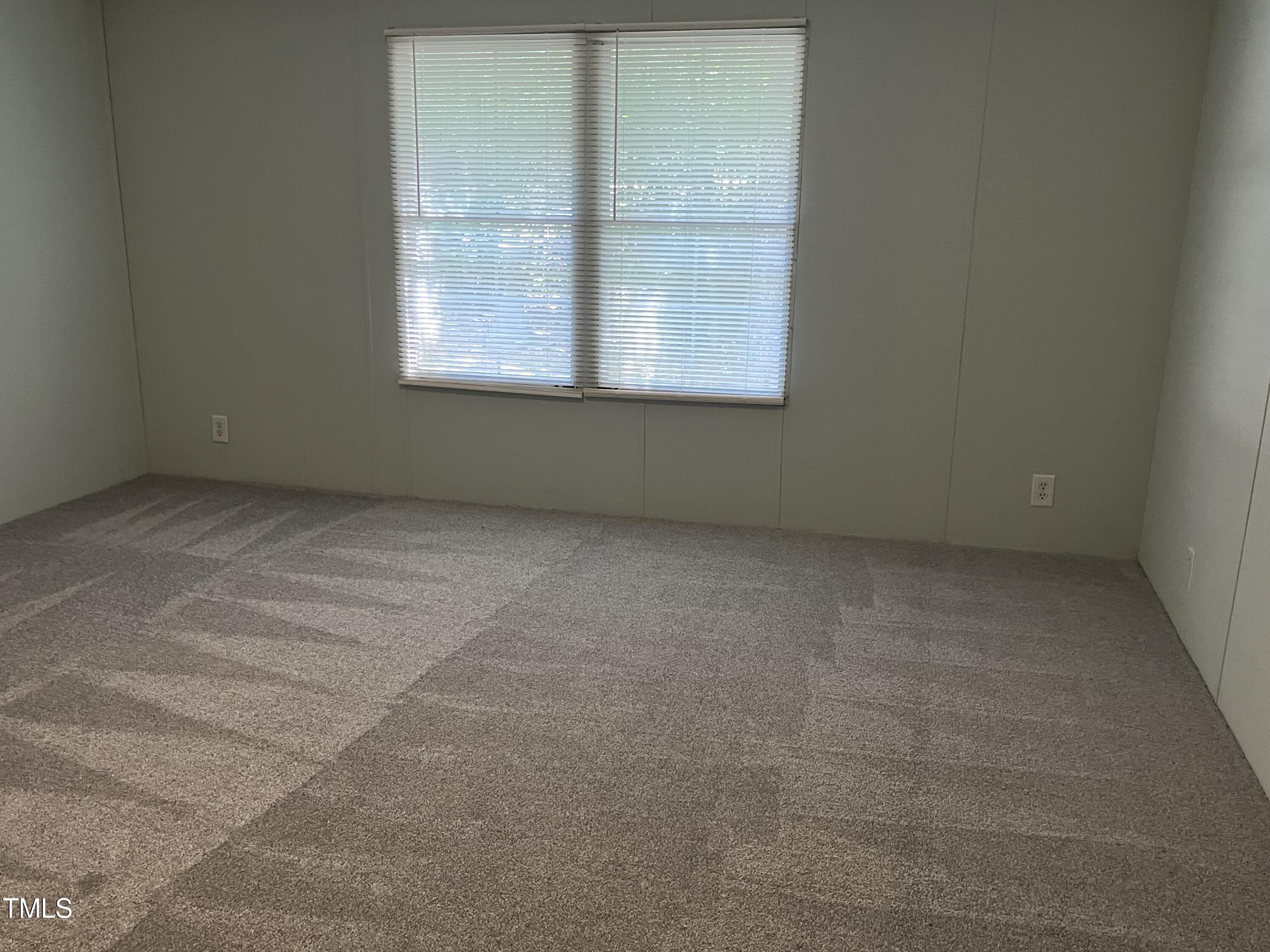 118 Portia Lane Roxboro, NC 27574 - Photo 10 of 16 an empty room with a window