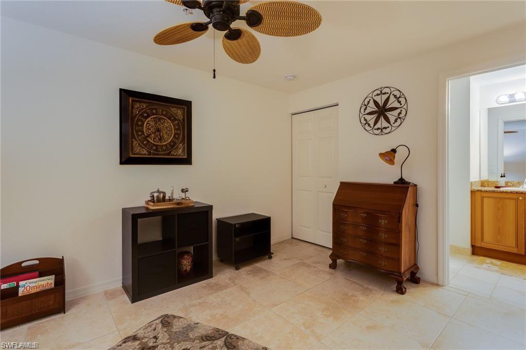 20201 Estero Gardens Circle, Unit 104 Estero, FL 33928 - Photo 11 of 38 a view of a workspace with furniture