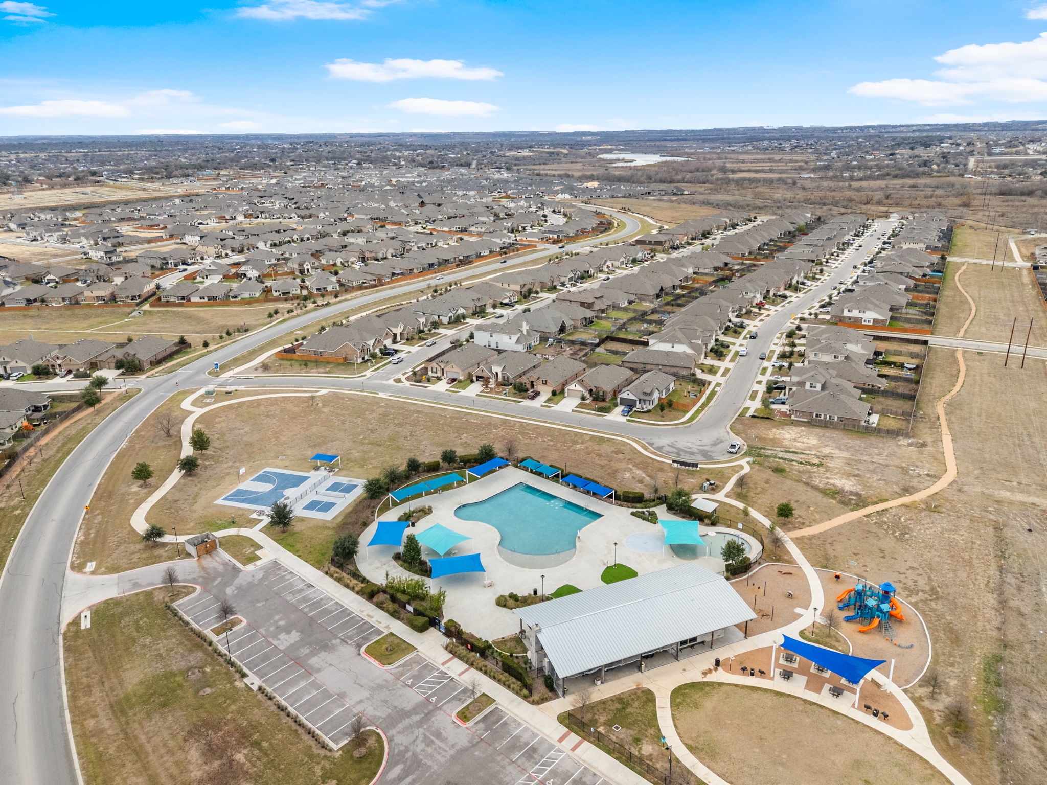 841 Spinnaker Loop Kyle, TX 78640 - Photo 9 of 40 Aerial view of residential area with a pool