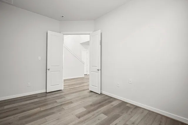 a kitchen with granite countertop a sink and a stove top oven