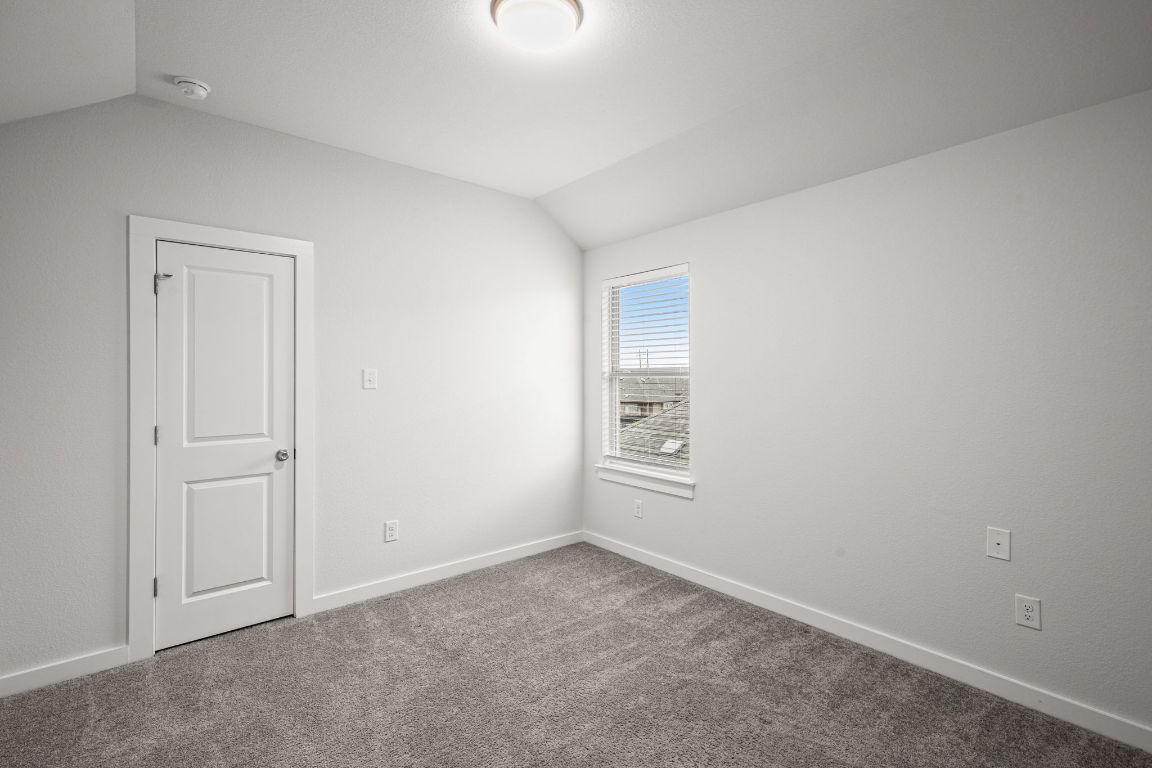 841 Spinnaker Loop Kyle, TX 78640 - Photo 31 of 40 an empty room with windows