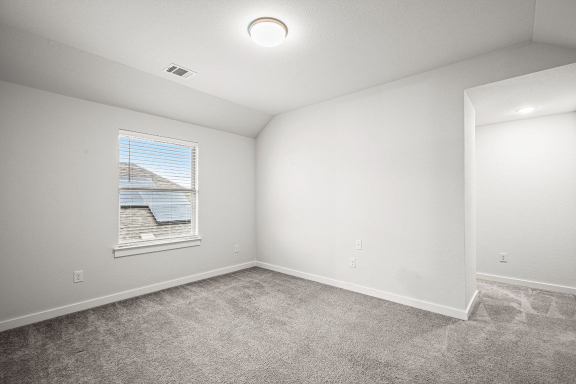 841 Spinnaker Loop Kyle, TX 78640 - Photo 32 of 40 an empty room with a window