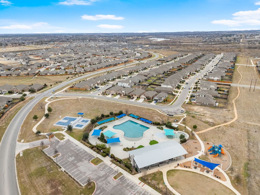 841 Spinnaker Loop Kyle, TX 78640 - Photo 38 of 40 an aerial view of residential houses with outdoor space
