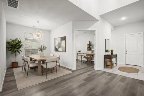 a view of kitchen with sink microwave and stove