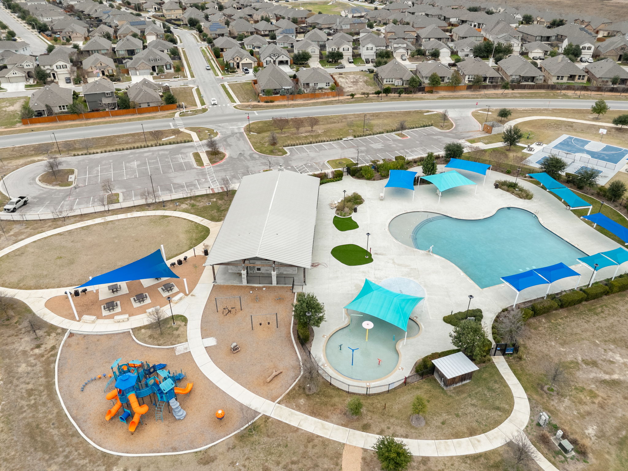 841 Spinnaker Loop Kyle, TX 78640 - Photo 8 of 40 Aerial perspective of suburban area with a pool