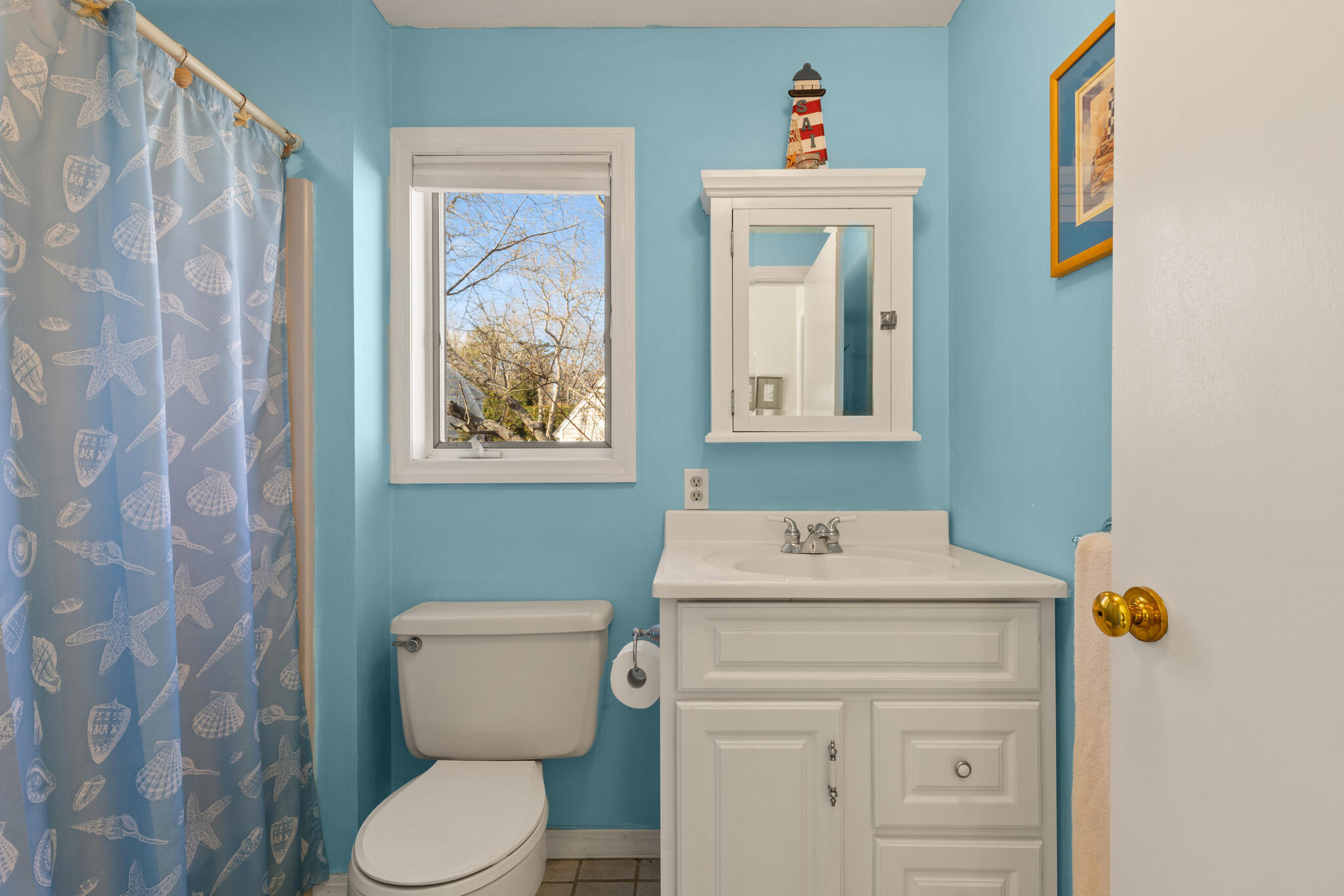103 Summersea Road Mashpee, MA 02649 - Photo 20 of 41 a bathroom with a toilet sink and mirror