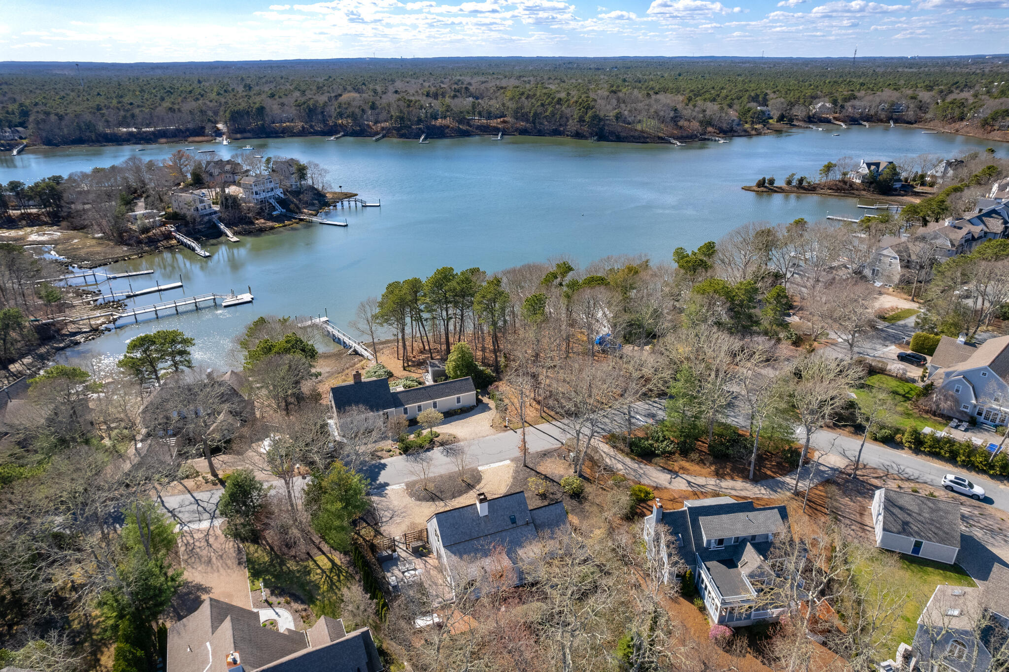 103 Summersea Road Mashpee, MA 02649 - Photo 4 of 41 an aerial view of ocean and residential houses with outdoor space