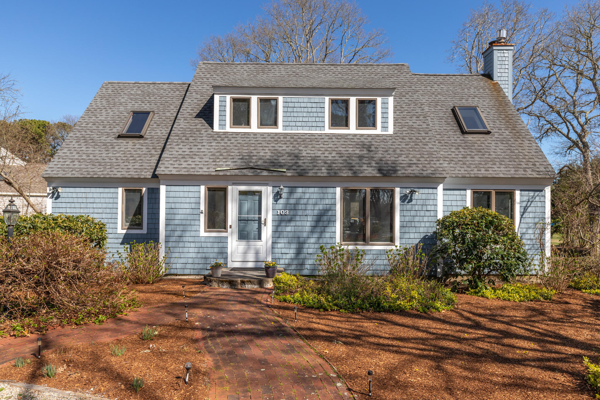 103 Summersea Road Mashpee, MA 02649 - Photo 5 of 41 front view of a house with a yard