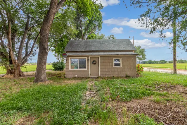 a picture of a bathroom with a sink and a mirror