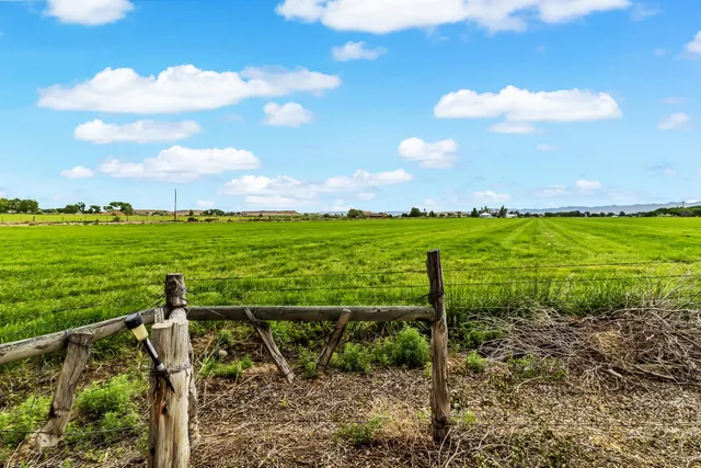 a view of an ocean and a yard