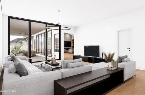 a kitchen with stainless steel appliances kitchen island granite countertop a stove a sink and a refrigerator