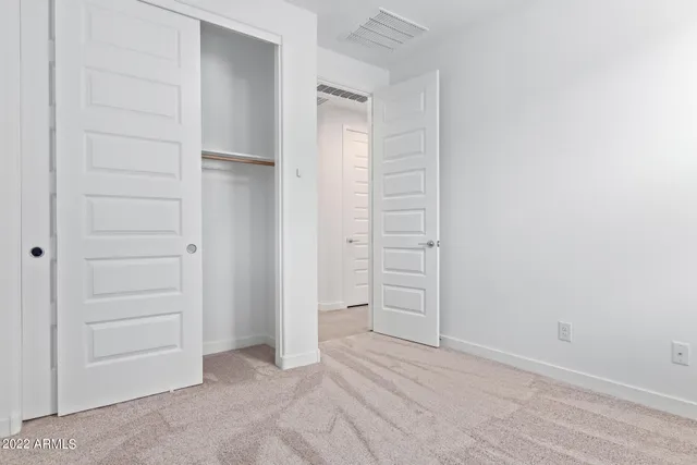 an empty room with closet
