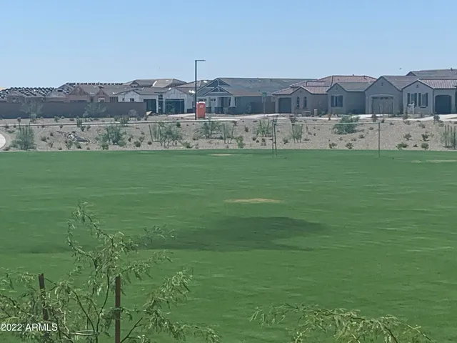 a view of a town with an ocean view