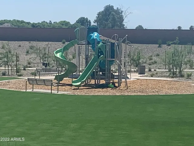 a view of a park with slide