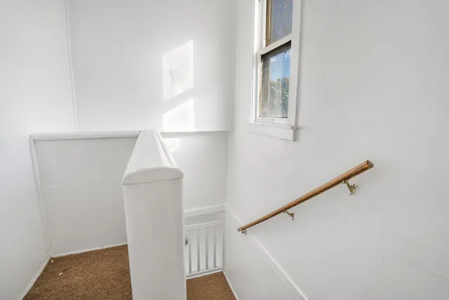 a view of entryway with stairs