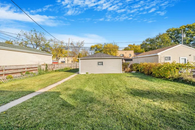 a view of a yard with an outdoor space