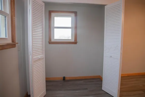 a view of small space with wooden floor