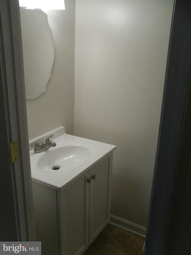 9349 Taney Road Manassas, VA 20110 - Photo 12 of 19 Main level half bath has new fixtures.