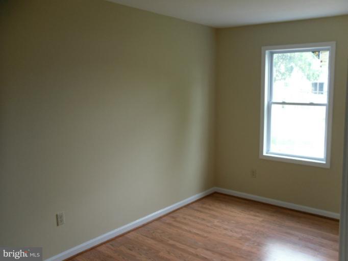 9349 Taney Road Manassas, VA 20110 - Photo 15 of 19 New window, flooring, and paint in BR2